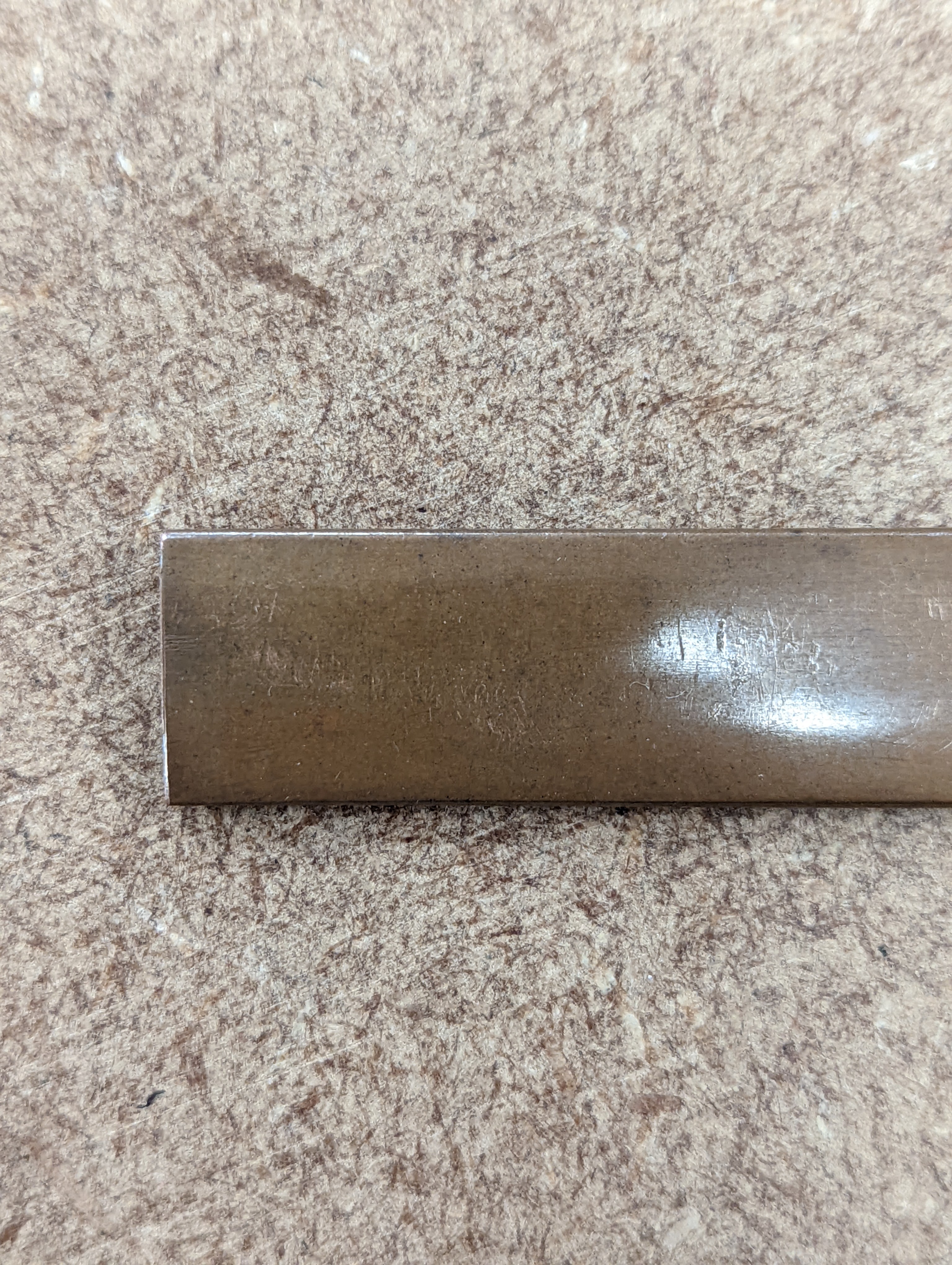 A Japanese mixed metal ‘dragon’ kozuka handle, 19th century, boxed